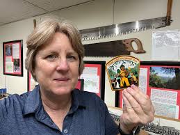 Smokey Bear pin made from repurposed charms