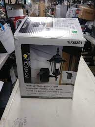 This well constructed outdoor wall light features a concealed built in gfci electrical outlet providing easy access power. Portfolio Gfci 15 75 In H Black Outdoor Wall Light Small House Hold Items And Tools Band Saw Table Saw Air Tools Air Conditioners And Much Much More Equip Bid