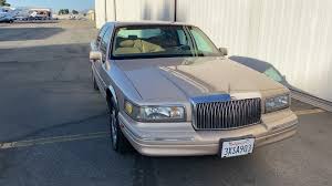 Image result for Light Prairie Tan 1997 Town Car