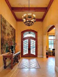 The hall was kept open and made interesting by adding an angled wall (p). Two Story Foyer From Drab To Pretty My Decorating Tips