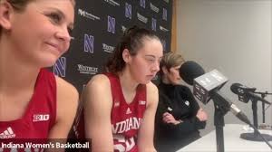 Teri Moren, Mackenzie Holmes and Sydney Parrish react to win at Northwestern