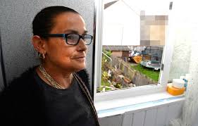 Gran, 51, left physically SICK as mum-of-11 neighbour's garden overflows  with rubbish attracting 'foot-long rats'