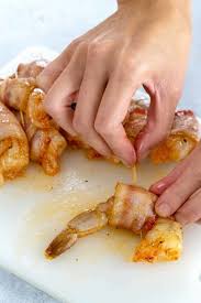 Wrap each shrimp in bacon and secure with a tooth pick. Bacon Wrapped Shrimp Recipe Jessica Gavin