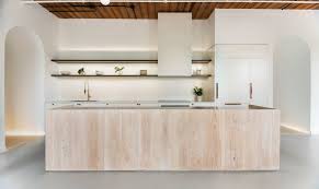 This log home renovation features beaded inset face frame cabinets built from vertical grain douglas fir. Douglas Fir And Cozy Lighting Shape Sensationally Refined Downtown Loft In Toronto