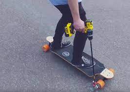 How To Make A Cheap And Easy Electric Skateboard With A Drill Interesting Engineering Electric Skateboard Powered Skateboard Motorized Skateboard