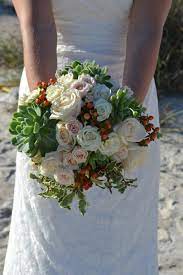We love designing custom floral bridal bouquets for your wedding. Flowers Of The Day Succulents And Roses