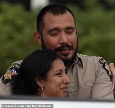 Cowardly Uvalde police RESTRAIN officer father whose daughter was one of 21  slaughtered in school