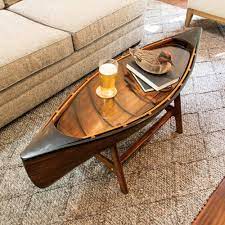 Handcrafted by our master canoe builders in canada and constructed with all the same techniques used to. Canoe Coffee Table Unique Coffee Table Boat Furniture Coffee Table