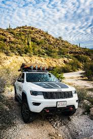 Grand cherokee is a medium sized jeep that possesses great potential and can accommodate 5 people effectively. Lifted Jeep Grand Cherokee Trailhawk On 33s Modified For Overland Expeditions Offroadium Com In 2021 Jeep Grand Cherokee Cherokee Trailhawk Grand Cherokee Trailhawk