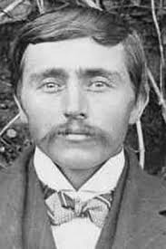 Why was A.J. Cowger buried alone in Webster County, WV?