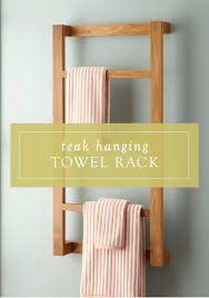 Combine a shower caddy with a command hook to make a produce rack. 9 Wooden Towel Rail Ideas Wooden Towel Rail Towel Rack Bathroom Towel