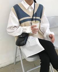 The perfect sweater can easily save your outfit's day. 15 Knit Vest Outfits To Look Fashion Forward Styleoholic