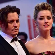 Amber Heard 'breaks down' as hearing