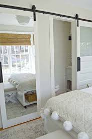 The dark finish of the cabinets coordinates well with the bedding and furnishings for a crisp, tailored look. A Guest Bedroom Makeover Update And Decorating Ideas