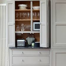 Country Style Kitchen With Seating Area Kitchen Decorating Ideal Home Grey Kitchen Cabinets Kitchen Decor Home Kitchens