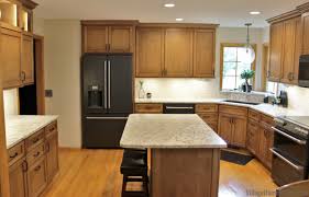 These kitchen cabinets black come in varied designs, sure to complement your style. Maple And Matte Black Kitchen Transitional Style Kitchen Kitchen Remodel Maple Kitchen