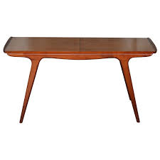 A vintage piece with a modern feel to build using the danish modern coffee table plans. Danish Mid Century Aerodynamic Expanding Coffee Table For Sale At 1stdibs