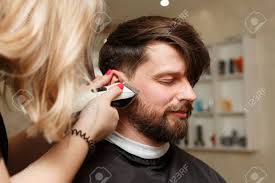 Professional Hairdresser Doing Haircut Men's Hair. Cutting Electric Razor.  Beauty Saloon. Male Beauty. The Client Is A Hipster. Stock Photo, Picture  and Royalty Free Image. Image 74637355.