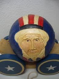1988 GREG BRIERE FOLK ART CARVED Roly Poly UNCLE SAM PULL TOY & CRADLE  Signed