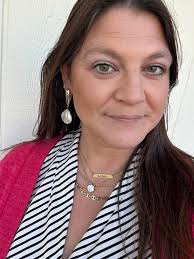 Wearing white with off white or cream intentionally with mixed accessories