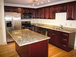 Cherry Cabinets With Granite Countertops Cherry Cabinets With Santa Cecilia Counter Cherry Cabinets Kitchen Kitchen Design Small Kitchen Cabinets And Granite