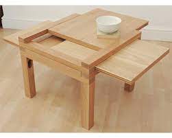 This lot matches lots 39 and 135. Oak Four Leaf Expandable Table Futon Company