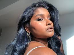 Select a dye that's a lighter shade than your natural color without being radically different, such as a dark brunette shade. Two Ways To Wear Rich Black Overtone