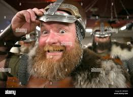 A member of the Jarl Squad dressed in a Viking suit at the Royal British  Legion club during their parade through the streets in Lerwick