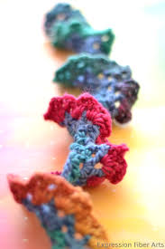 I used size 3,5 mm needles (us dont cut the yarn, crochet the straight edge of the scarf (from point to point) with a 3,5 mm crochet hook. A Beautiful Tree Frog Crocheted Scarf Expression Fiber Arts A Positive Twist On Yarn