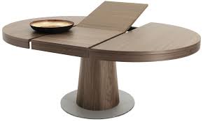 You can also buy a table with wheels and use it for different purposes. Extendable Dining Tables Granada Table With Supplementary Tabletop Round Extendable Dining Table Round Dining Table Modern Dining Table