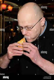 Barry Rigby taking part in the World Pie Eating Championships at Harry's Bar,  Wigan where the aim of the competition is to see who can eat a pie in the  fastest time,