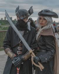 First time cosplaying with my GF, had to honour my favorite game :  r/bloodborne