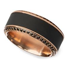Black diamonds are treated to permanently create the intense black color. Helios Beveled Rose Gold Elysium Black Diamond Wedding Band
