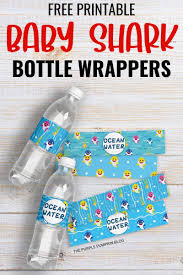 This collection includes baby shark party invitations, favor tags, baby shark cupcake toppers, blank food cards, some baby shark welcome signs, water bottle labels, straw flags, and a 'happy birthday' banner. Free Printable Baby Shark Bottle Wrappers Baby Shark Party Printables