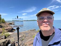 Trying out my new wetsuit at Presque Isle Marquette.