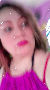 Urban Rainy Day Scenes Featuring a Pink Garment