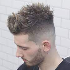 The mid fade is yet another kind of taper fade where in the fading out starts at the nearly the middle of the scalp. 35 Best Faux Hawk Fohawk Haircuts For Men 2021 Styles