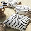 For extra seating with a casual, boho vibe, consider adding a couple of floor pillows or poufs to the mix! 1