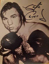 George Chuvallo. Never knocked off his feet in a career spanning the  1950s-1970s. Record 73-18-1, 63 knockouts. Beat top contenders Doug  Jones,Jerry Quarry, Manuel Ramos, Cleveland Williams, etc.