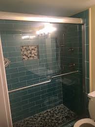 Large Glass Aqua Subway Tile In Shower With Sliced Bali Turtle Pebble Tile Shower Floor Https Www S Shower Tile Pebble Tile Shower Pebble Tile Shower Floor