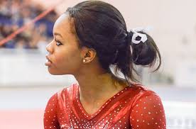 Gabby douglas competes on the balance beam during the women's qualifications. U S Gabby Douglas Becomes Ambassador Of Nike S Equality Campaign Wogymnastika