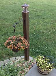Do It Yourself Lamp Post With Hanging Basket One 4x4 Post Concreted In Ground Hanging Basket Bracket Garden Front Of House Vertical Garden Diy Front Yard
