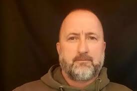 Hero Brit ex-CIA agent who was tortured by Taliban handed prestigious  veteran's award