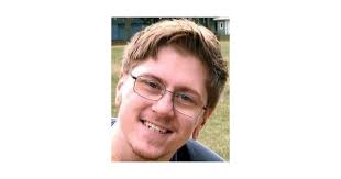 Eric Carroll Obituary (1995