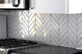 The chevron pattern has become more and more popular because of its versatility and unique design. Kiln Chevron Silver Fox Gray Ceramic Tile Chevron Tile Chevron Tile Kitchen Colors Kitchen Backsplash