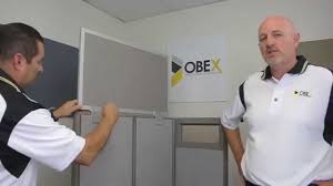 Office cubicles are frequently used to give people space when they are at work. Installing Obex Desk Cubicle Mounted Privacy Panels Youtube