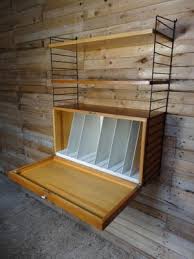 Is a 1959 studio album recorded by peggy lee conducted by jack marshall. Wall Unit With Record Cabinet Two Shelves By Nisse Strinning For String 1950s For Sale At Pamono