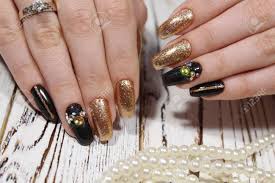 Nov 02, 2019 · color de uñas para vestido negro con dorado is now staying widely popular by friends all around us, one of these buddy. Manicura De Moda En Unas Largas De Color Dorado Y Negro Fotos Retratos Imagenes Y Fotografia De Archivo Libres De Derecho Image 95915308