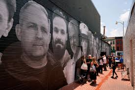 Families of Americans detained abroad unveil mural, call