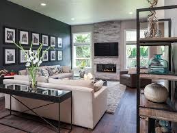 Rustic materials like upholstery, leather, metal, and wood add warmth while the accent pieces are distinctly modern. Modern Masculine Home With Rustic Industrial Touches Modern Rustic Living Room Farm House Living Room Modern Farmhouse Living Room Decor